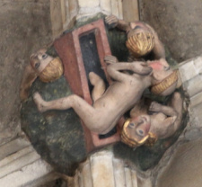 Roof Boss NN14 from Norwich Cathedral, depicting some of the dead rising at the last judgement. A mix of buried people and those in tomb chests or coffins are visible.