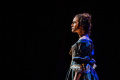 Photo by Brittany Diliberto, Bee Two Sweet Photography. Nell Gwynn (Alison Luff) stands alone on stage.