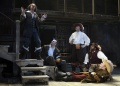 Eric Hissom (Cyrano) with Chris Genebach, Todd Scofield, Richard Ruiz, and Dan Crane (The Gascony Guard), Cyrano, by Edmond Rostand, translated and adapted by Michael Hollinger, adapted and directed by Aaron Posner, Folger Theatre, 2011. Carol Pratt.