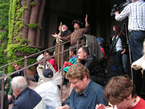 The performance of the Chester Balaam and Balaak by actors from Duquesne University. Here, the actors have purposely moved from their pageant to the stairs at the rear of the audience, subverting modern performance expectations.